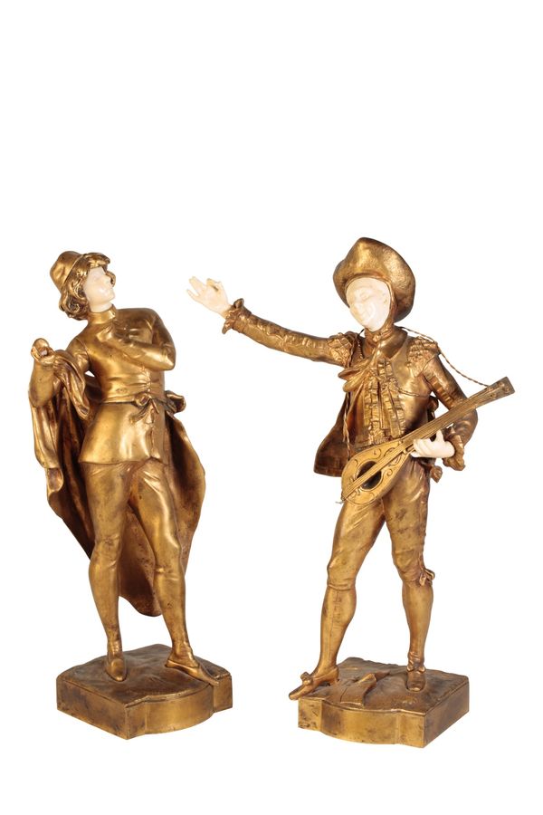 AUGUSTE MOREAU (1834 - 1917): A PAIR OF GILT BRONZE AND IVORY FIGURES