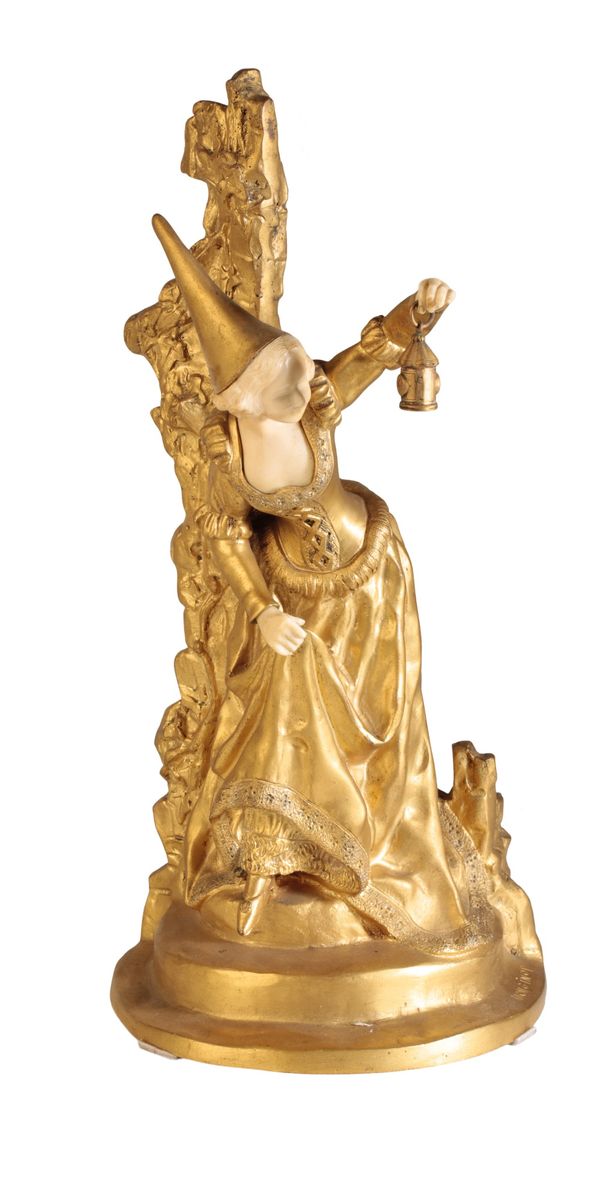 •CHARLOTTE MONGINOT (1872 - 1962): A GILT BRONZE AND IVORY SCULPTURE