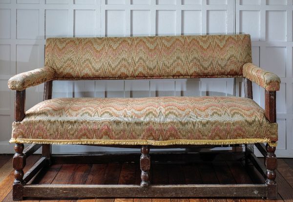 A CHARLES II OAK SOFA