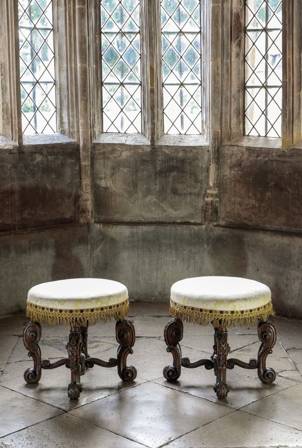 A PAIR OF WILLIAM III WALNUT CIRCULAR STOOLS