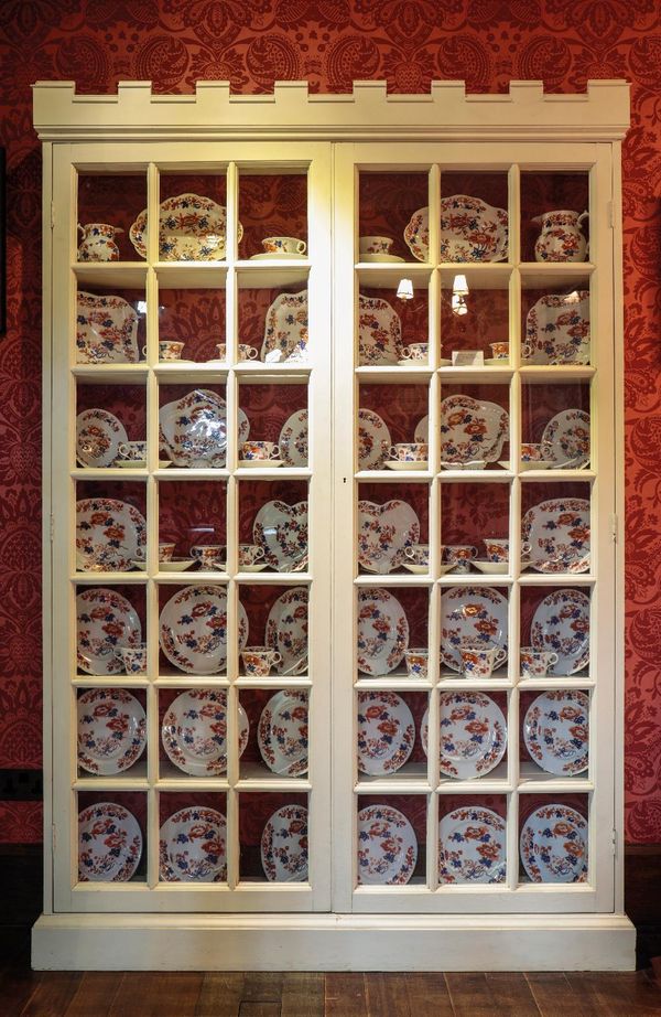 A WHITE PAINTED BOOKCASE OR CHINA CABINET