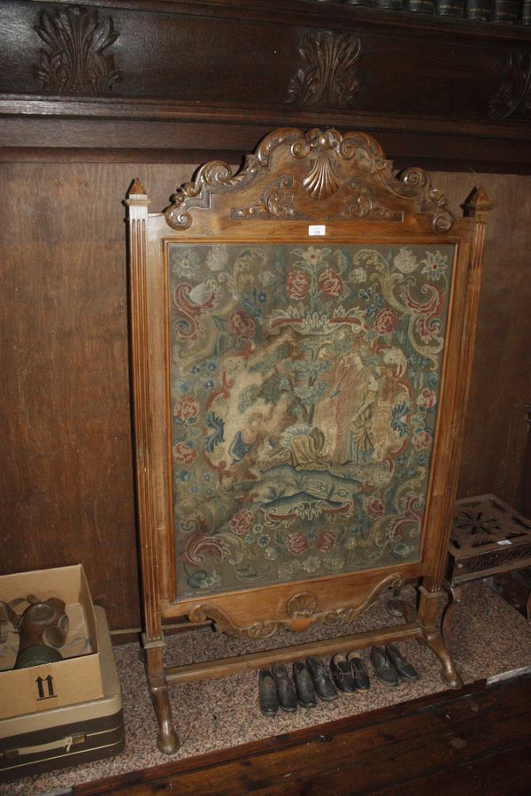 A WALNUT FIRESCREEN