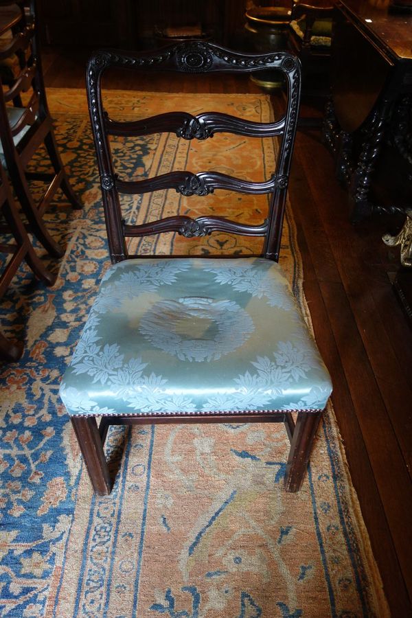 A SIMILAR PAIR OF CHAIRS ENSUITE