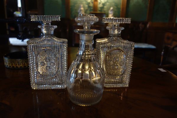 A PAIR OF CUT-GLASS DECANTERS