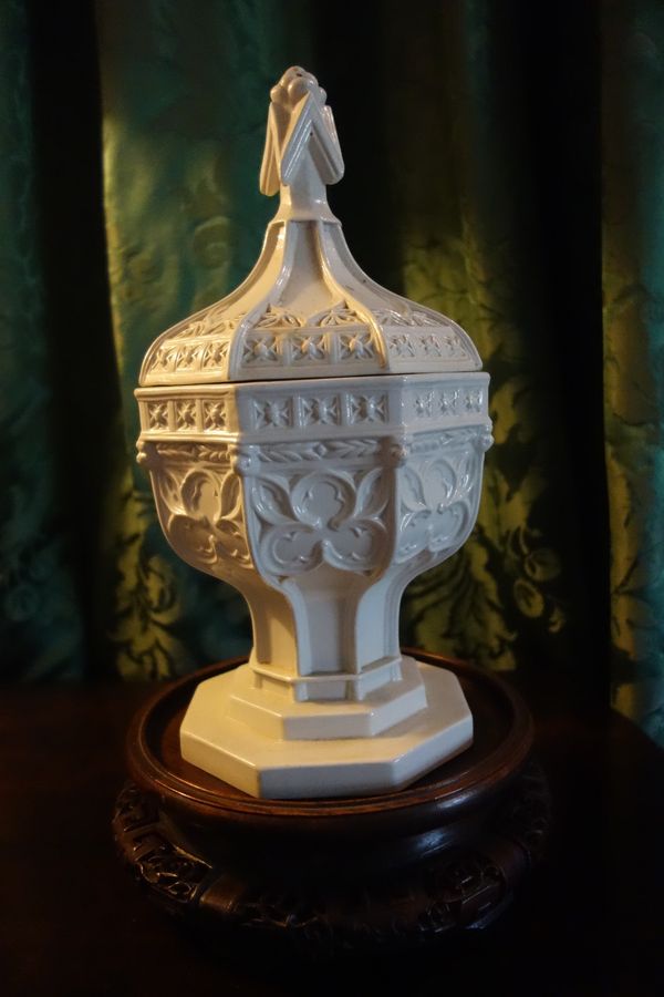 A MINTON GLAZED PARIANWARE MODEL OF A FONT