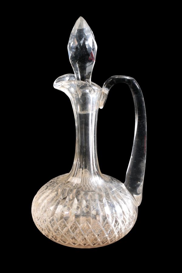 AN EARLY VICTORIAN CUT GLASS WINE CARAFE