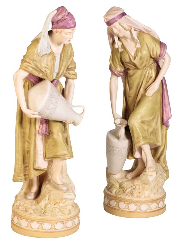 ROYAL DUX: A PAIR OF PORCELAIN WATER-CARRIERS