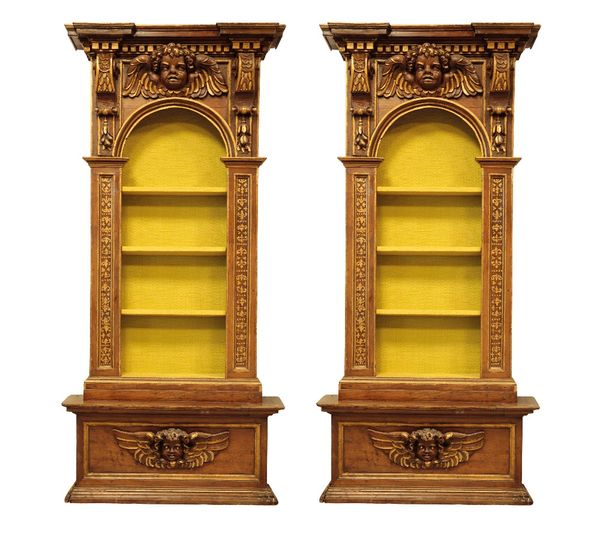 PAIR OF "BAROQUE" WALNUT AND PARCEL-GILT LIBRARY BOOKCASES 