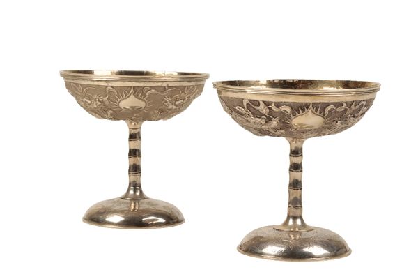 PAIR OF SILVER 'DRAGON' STEM CUPS, LATE QING DYNASTY