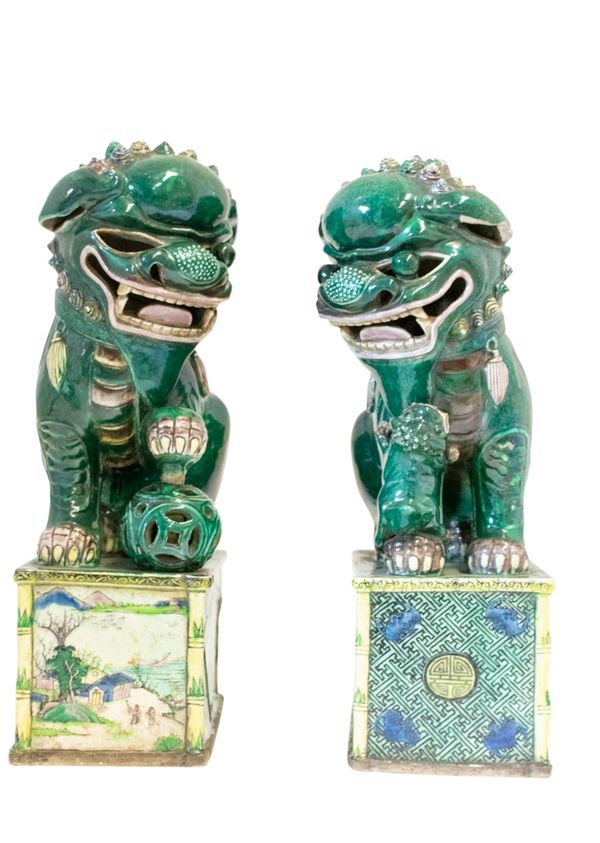 LARGE PAIR OF FAMILLE VERTE POTTERY LION DOGS, QING DYNASTY, 19TH CENTURY