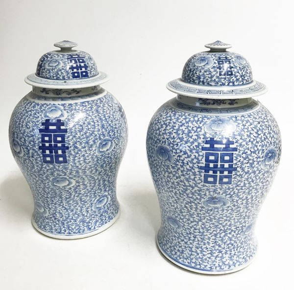 LARGE PAIR OF 'DOUBLE-HAPPINESS' BLUE AND WHITE JARS AND COVERS, QING DYNASTY, 19TH CENTURY