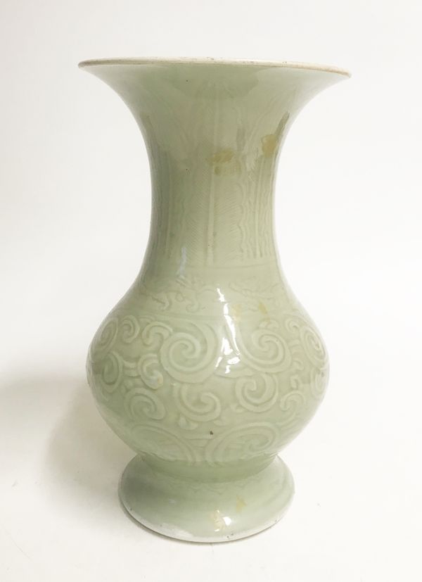 LARGE CELADON-GLAZE CARVED HU FORM VASE, QING DYNASTY, 19TH CENTURY