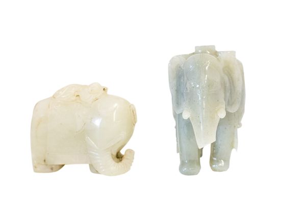 TWO CARVED JADE FIGURE OF ELEPHANTS, 20TH CENTURY