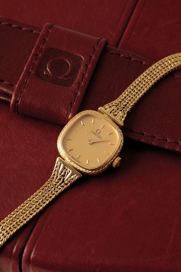 OMEGA 18CT GOLD LADY'S BRACELET WATCH