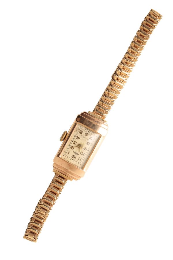 TREBEX 9 CT GOLD LADY'S BRACELET WATCH