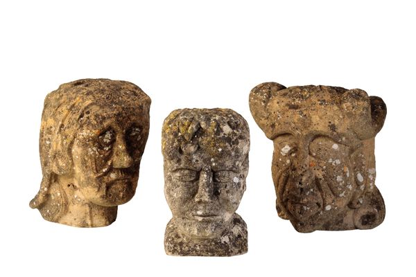 GROUP OF THREE SCULPTED SANDSTONE HEADS