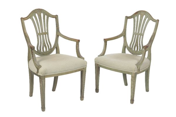 PAIR OF GEORGE III CARVED AND PAINTED ELBOW CHAIRS