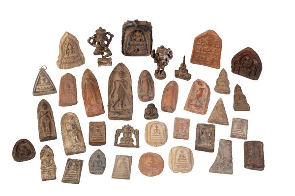 ASSORTED GROUP OF BUDDHIST STONE AND METAL TABLETS AND FIGURES