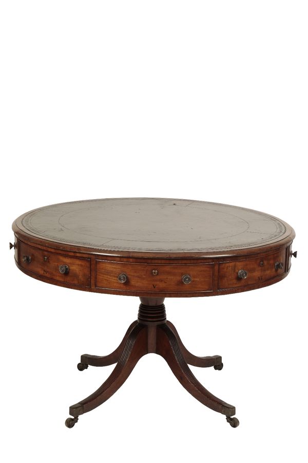 REGENCY MAHOGANY AND GILT TOOLED LEATHER INSET LIBRARY DRUM TABLE