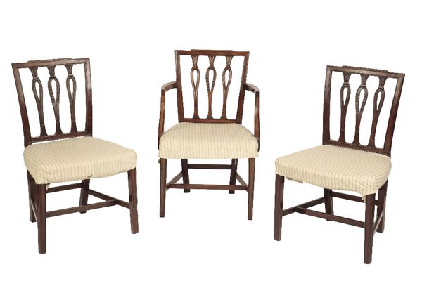 SET OF EIGHT CARVED AND STAINED MAHOGANY AND UPHOLSTERED CHAIRS IN GEORGE III STYLE