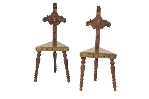 PAIR OF DUTCH CARVED OAK AND FAUX LEATHER HALL CHAIRS