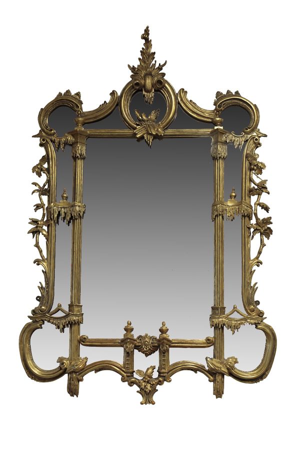 CARVED GILTWOOD AND COMPOSITION MARGINAL WALL MIRROR IN LOUIS XV STYLE