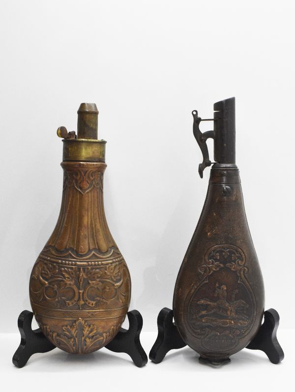 G.J.W. HAWKSLEY OF SHEFFIELD: A LEATHER AND BRASS POWDER FLASK