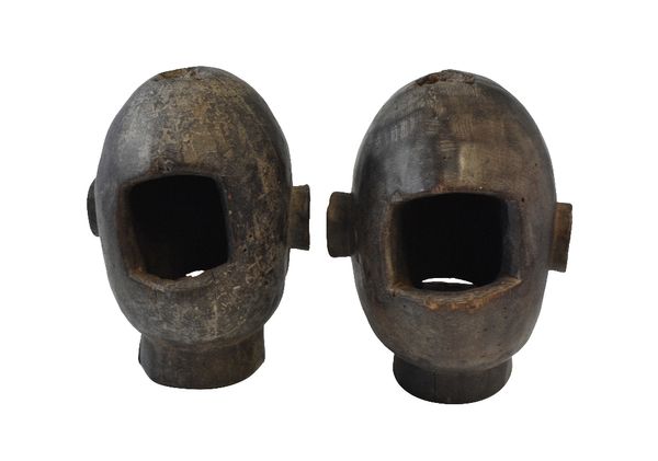 TWO WOODEN TRIBAL HEADS