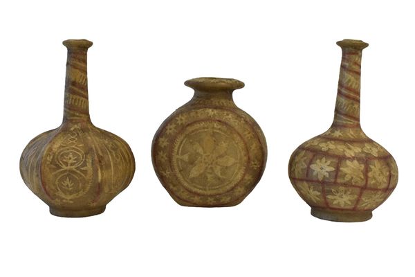 SET OF THREE NORTH AFRICAN SKIN BOTTLES