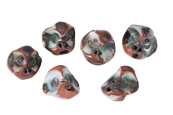 *GUY SYDENHAM (1916 - 2005): A SET OF SIX "MONKEY" BUTTONS