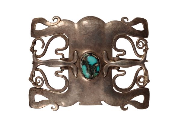 OLIVER BAKER FOR LIBERTY & CO: AN ART NOUVEAU SILVER AND MATRIX TURQUOISE STONE SET BUCKLE