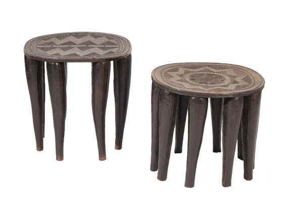 TWO SIMILAR AFRICAN CARVED AND STAINED HARDWOOD STOOLS