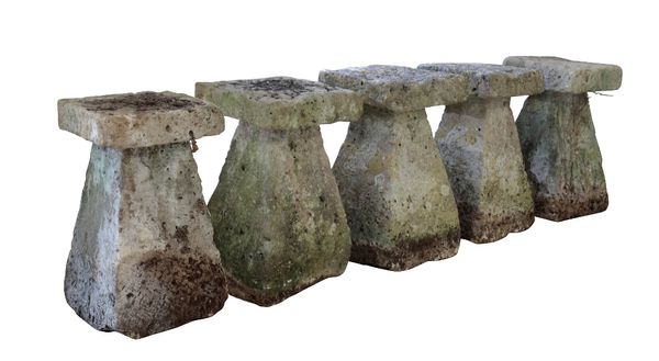 FIVE IMPRESSIVE AND SUBSTANTIAL FOSSILISED LIMESTONE STADDLESTONES AND CAPS