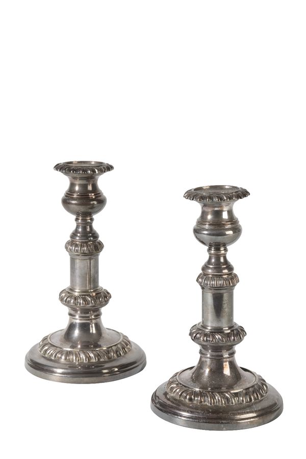 TWO PAIR OF GEORGIAN STYLE SILVER PLATED CANDLESTICKS