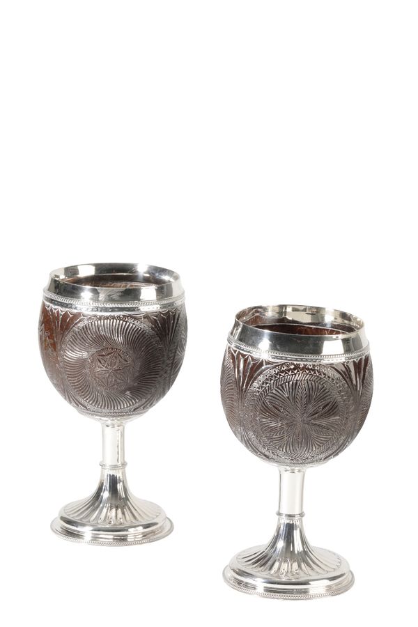 MATCHED PAIR OF GEORGE III SILVER MOUNTED COCONUT CUPS, ONE BY PHIPPS AND ROBINSON