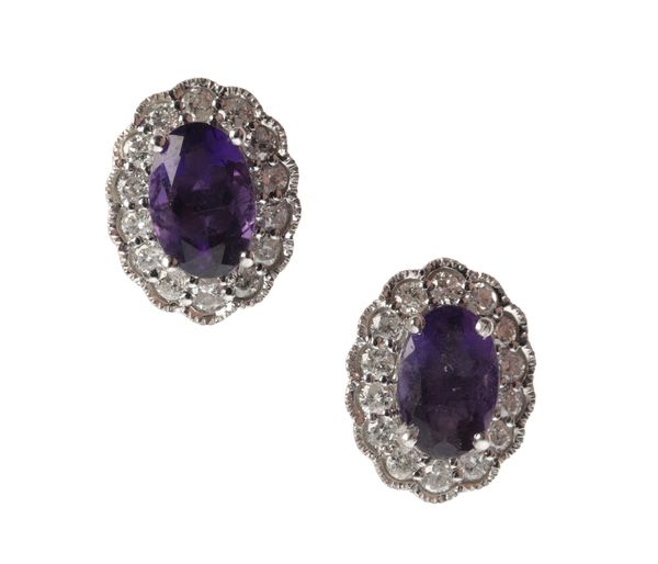 A PAIR OF AMETHYST AND DIAMOND CLUSTER EARRINGS