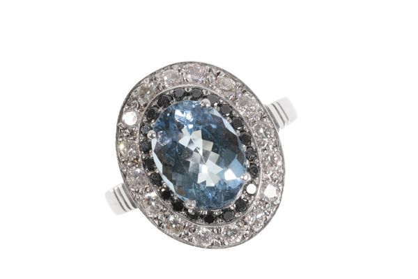 AN AQUAMARINE, BLACK DIAMOND AND DIAMOND RING