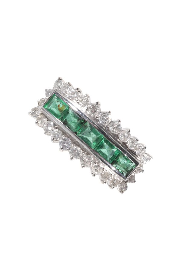 AN EMERALD AND DIAMOND RING