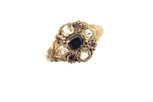 A SAPPHIRE, CHRYSOBERYL AND GARNET RING