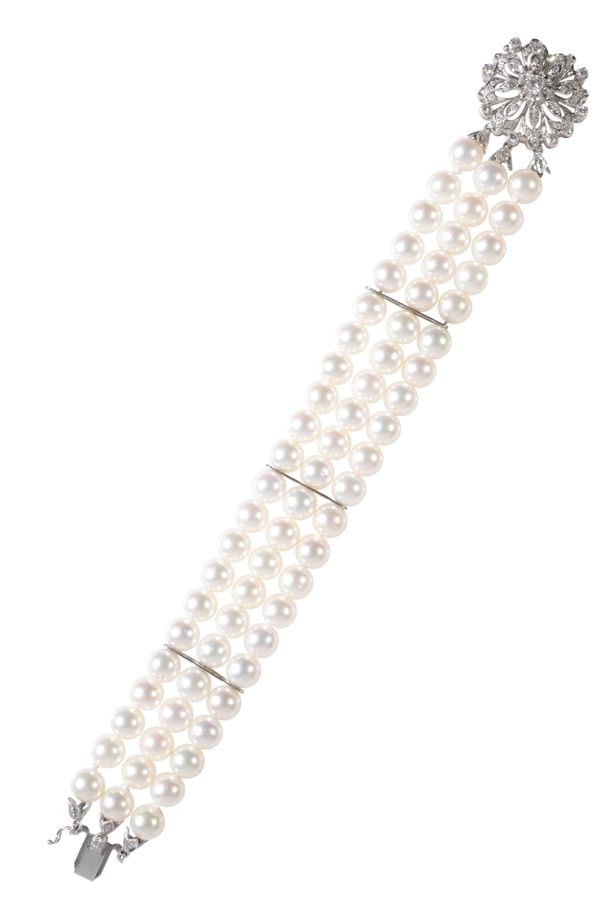 A CULTURED PEARL AND DIAMOND BRACELET