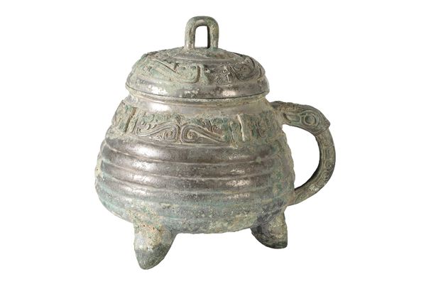ARCHAIC STYLE SILVERED BRONZE COVERED VESSEL