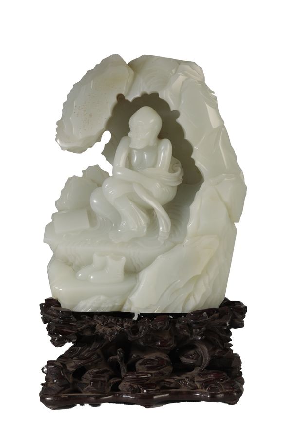 FINE CARVED WHITE JADE GROUP, QING OR LATER