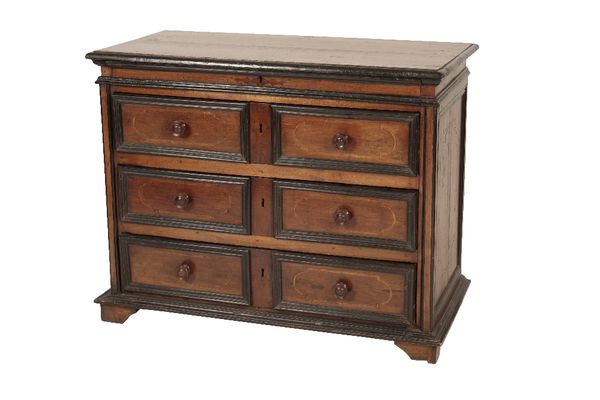 ITALIAN WALNUT AND EBONISED WOOD CHEST OF DRAWERS