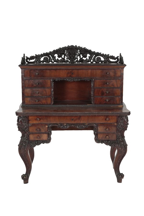 CONTINENTAL CARVED AND PART EBONISED WALNUT BUREAU DESK