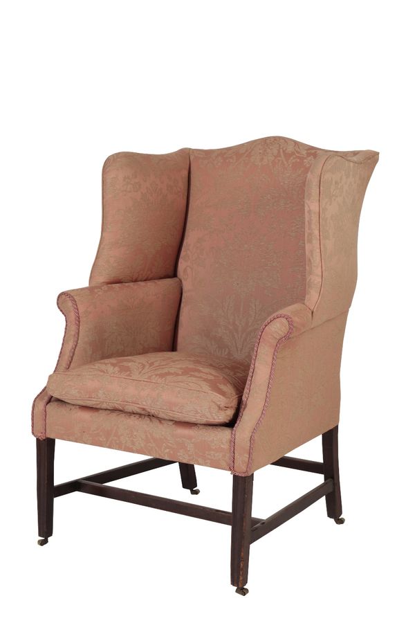 LATE GEORGE II OR GEORGE III WALNUT AND LATER UPHOLSTERED WING ARMCHAIR