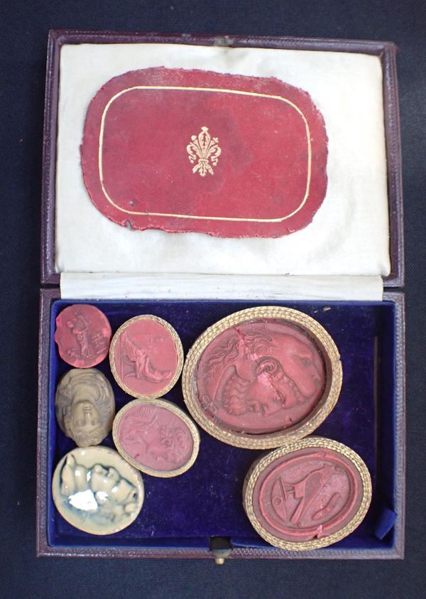 SIX 19TH CENTURY RED WAX AND CERAMIC INTAGLIOS