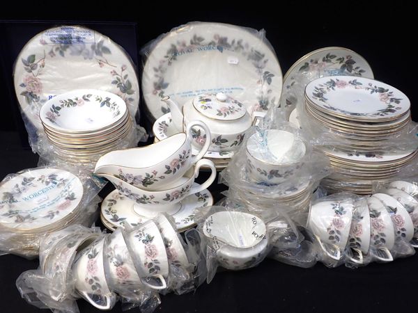 A ROYAL WORCESTER 'JUNE GARLAND' DINNER SERVICE