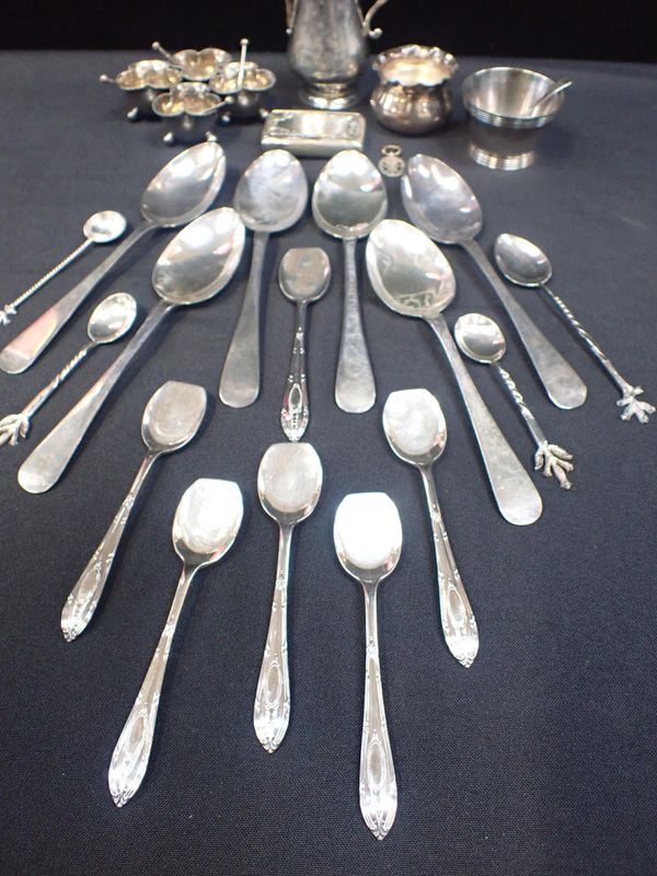 A SET OF FOUR PLATED SALTS WITH SPOONS