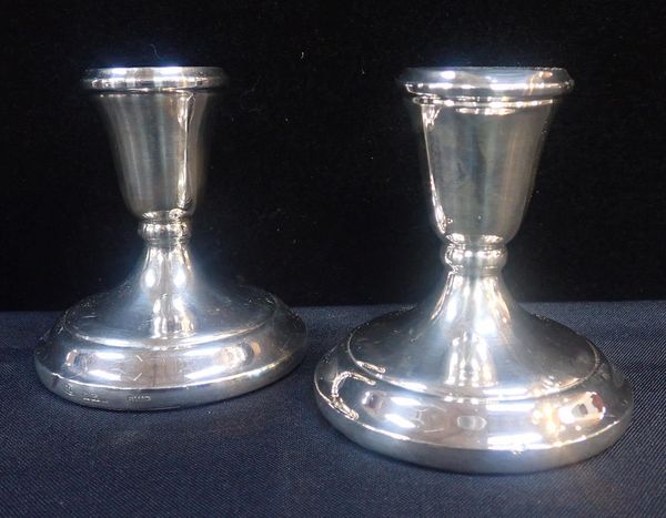 A PAIR OF SILVER SQUAT CANDLESTICKS