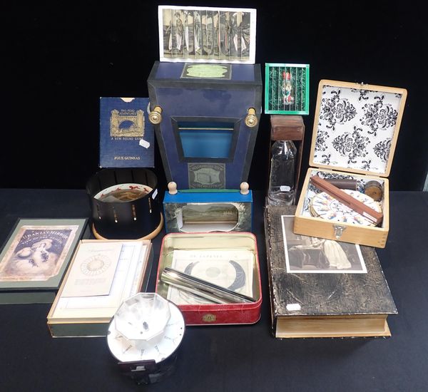 A COLLECTION OF REPLICA OPTICAL TOYS AND GAMES